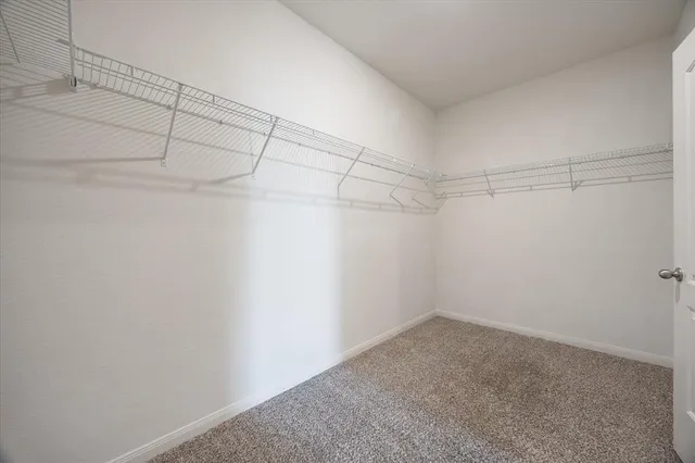 a view of a house with a snow in a yard