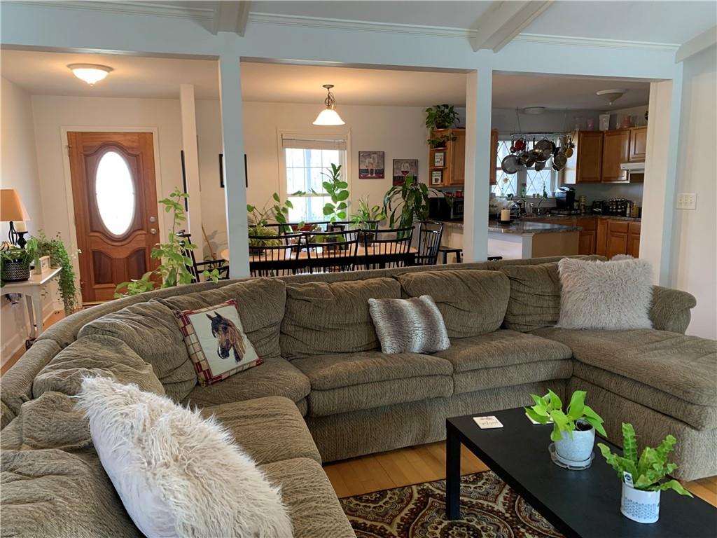 6911 Alexander Farm Road Monroe, NC 28110 - Photo 24 of 48 a living room with furniture and a large mirror