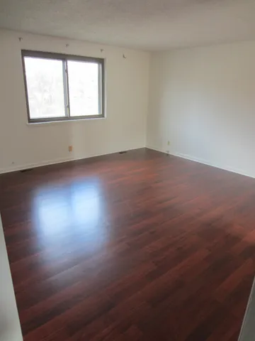 a kitchen with a sink and a window