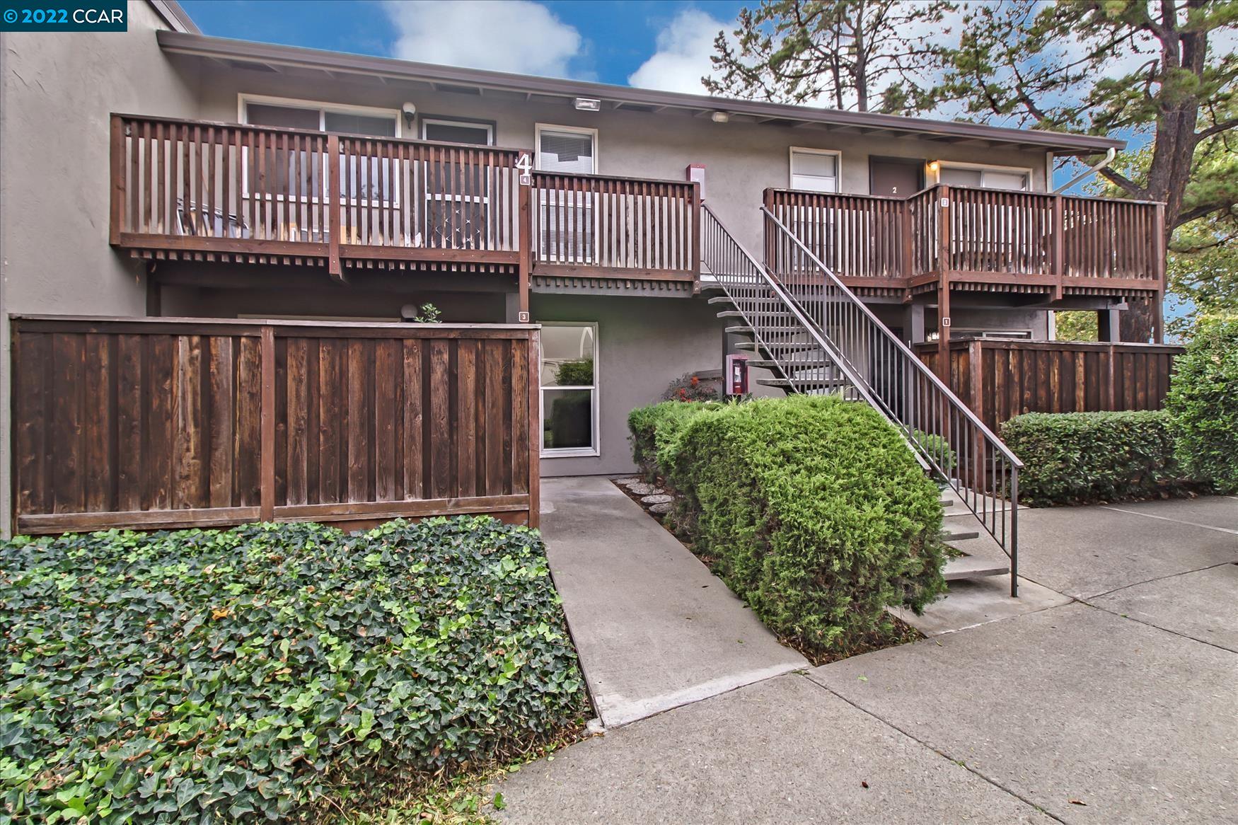 1060 Oak Grove Road, Unit 3 Concord, CA 94518 - Photo 1 of 1 a view of entryway with wooden stairs