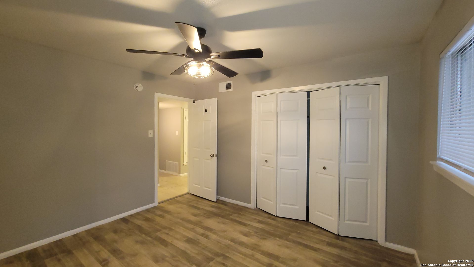 516 Gentleman Road, Unit 5 Balcones Heights, TX 78201 - Photo 10 of 15 wooden floor in an empty room