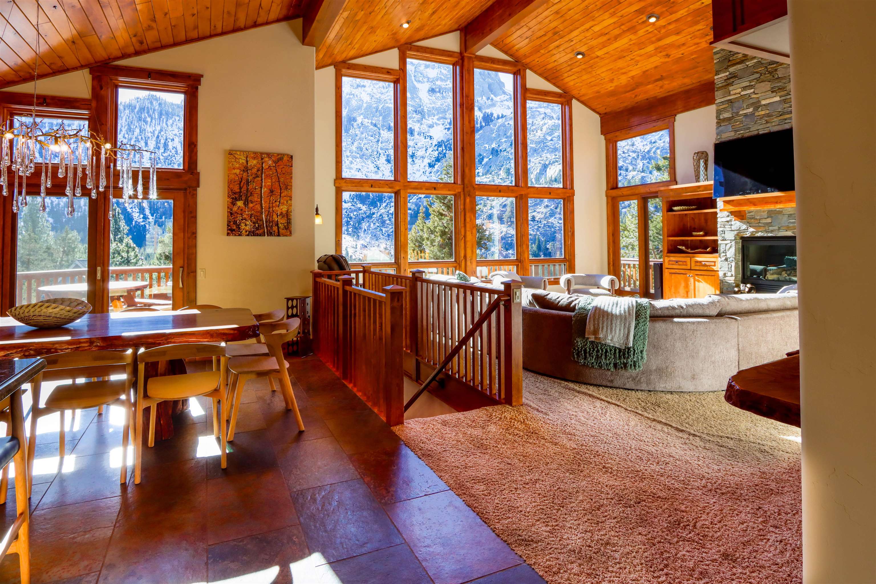 131 West Steelhead Road June Lake, CA 93529 - Photo 13 of 47 a living room with furniture a rug and a floor to ceiling window