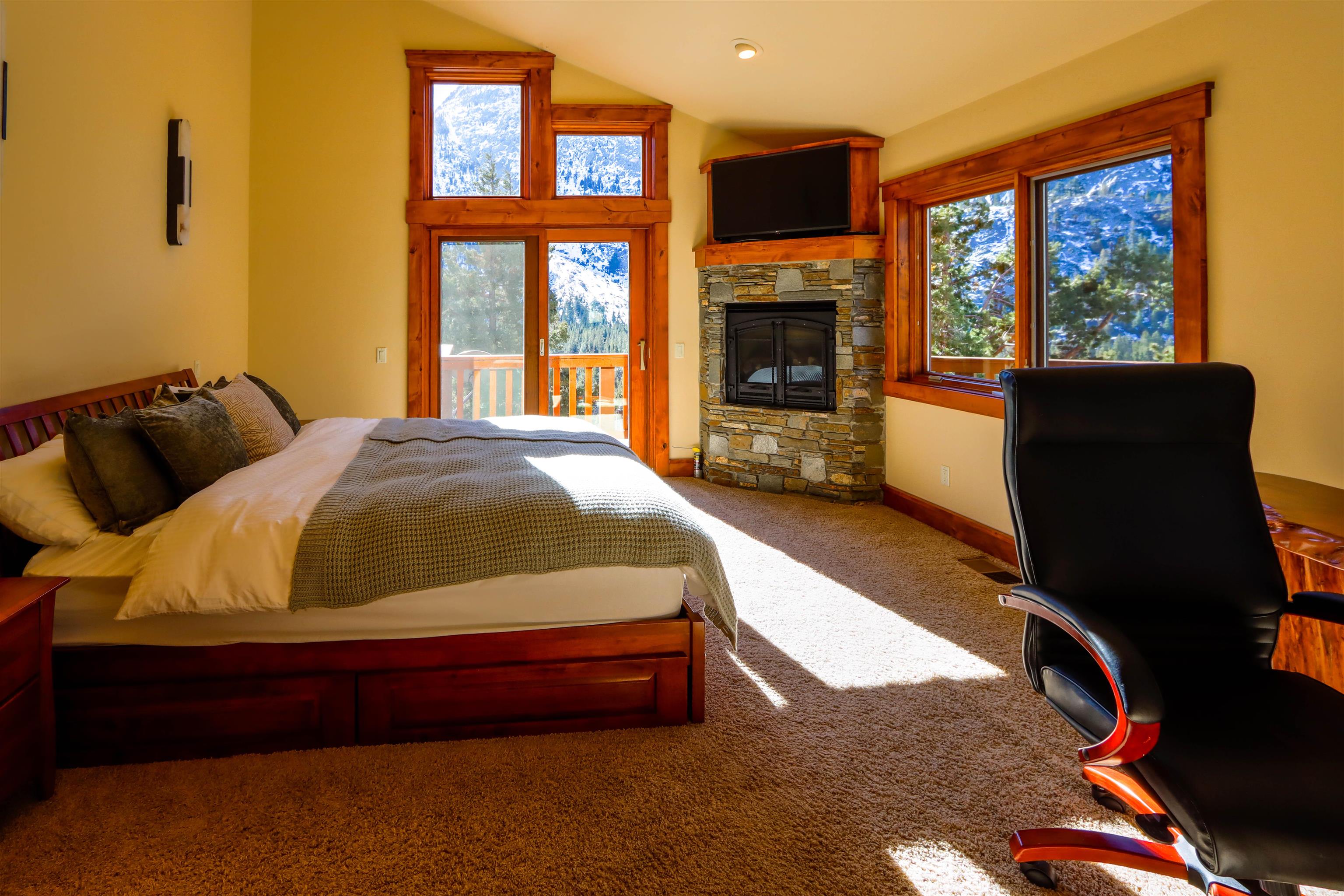 131 West Steelhead Road June Lake, CA 93529 - Photo 14 of 47 a bed sitting in a bedroom next to a window