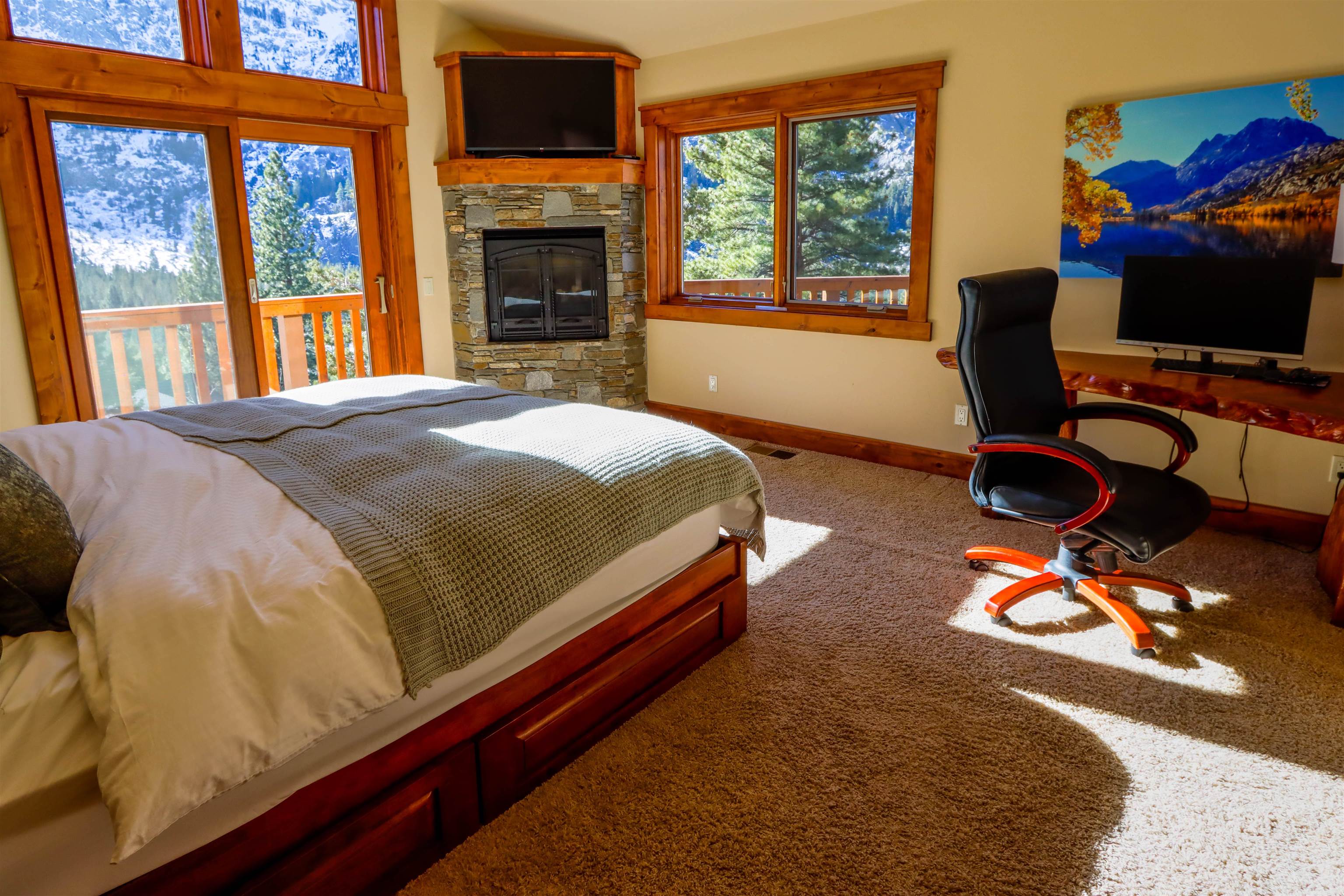 131 West Steelhead Road June Lake, CA 93529 - Photo 15 of 47 a bedroom with a bed and a large window