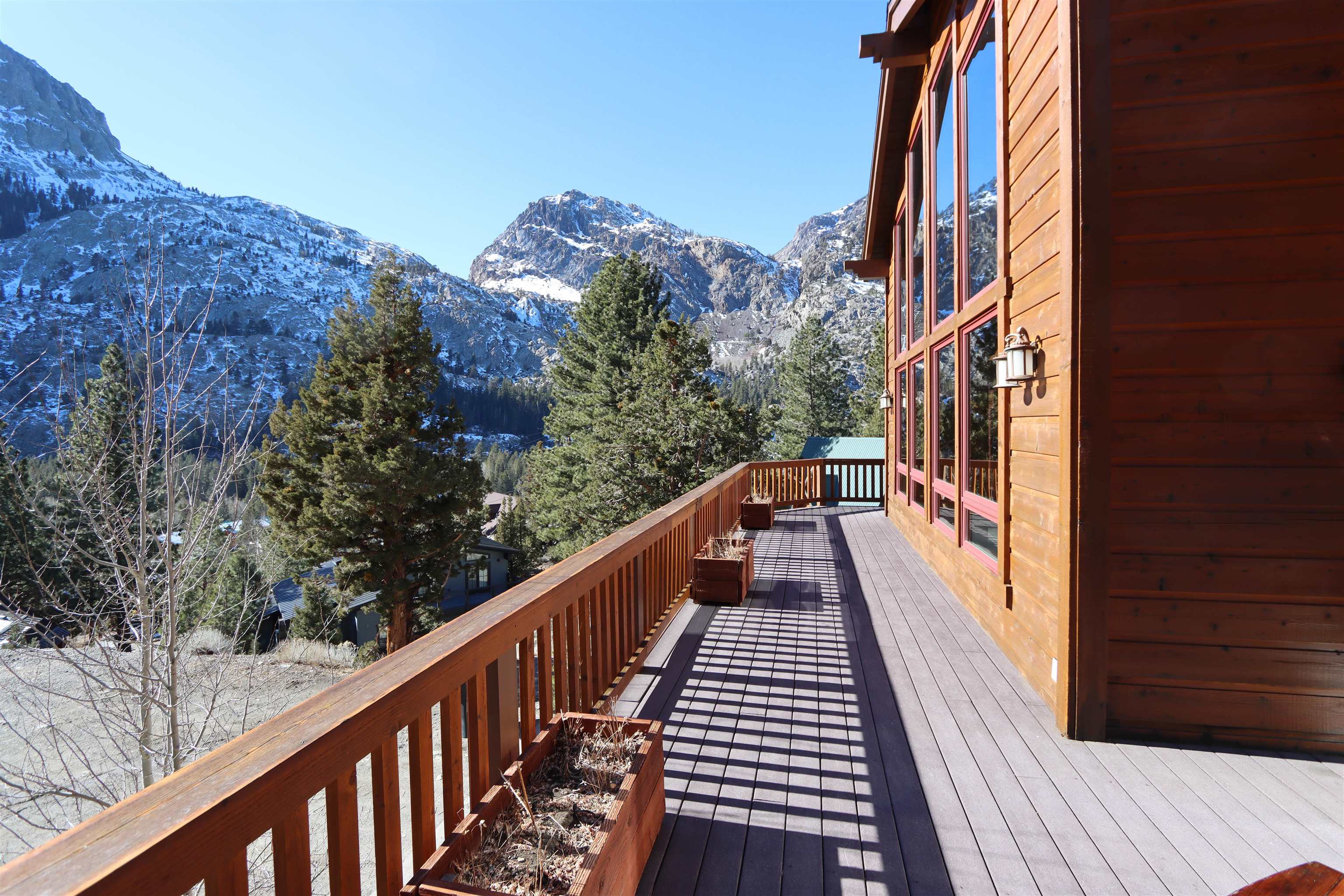 131 West Steelhead Road June Lake, CA 93529 - Photo 40 of 47 a view of balcony with wooden floor and fence