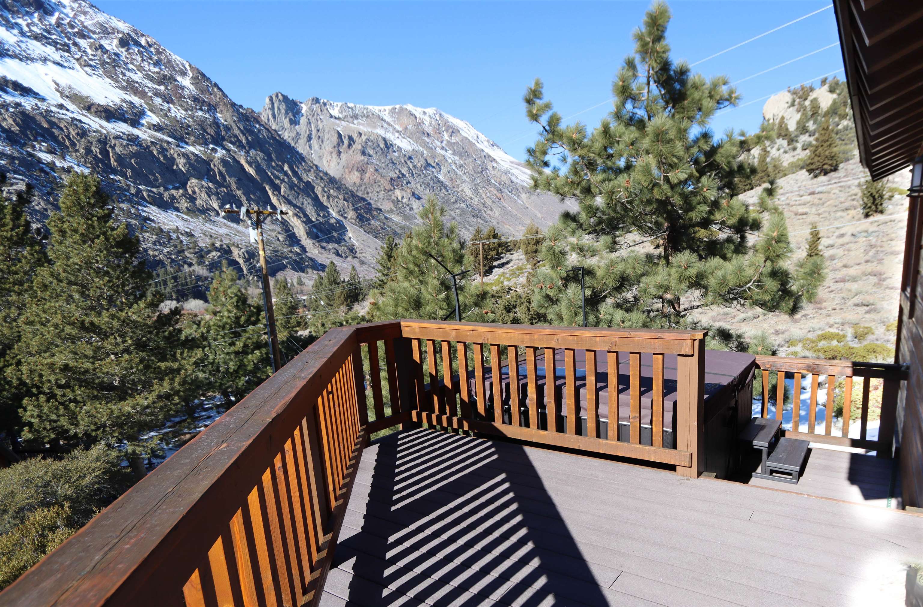 131 West Steelhead Road June Lake, CA 93529 - Photo 42 of 47 a balcony with wooden floor and fence