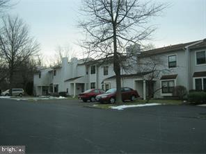 234 Fir Tree Court Marlton, NJ 08053 - Photo 2 of 12 a front view of a house with a yard