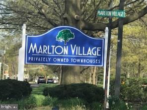 234 Fir Tree Court Marlton, NJ 08053 - Photo 4 of 12 a sign on the side of a building