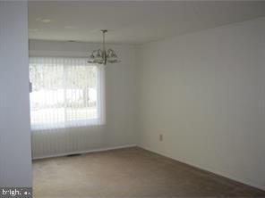 234 Fir Tree Court Marlton, NJ 08053 - Photo 5 of 12 an empty room with a window