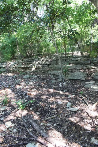 a balcony with a outdoor seating space