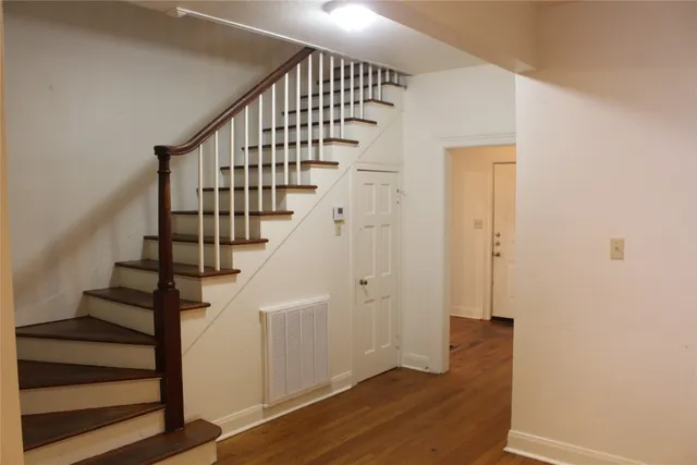 a view of entryway with wooden floor