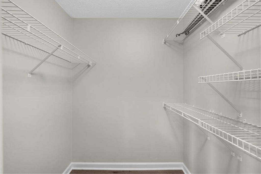 123 Streamside Drive Roswell, GA 30076 - Photo 34 of 36 a view of small space with racks on the wall