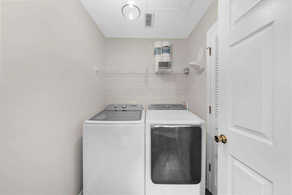123 Streamside Drive Roswell, GA 30076 - Photo 35 of 36 a utility room with dryer and washer