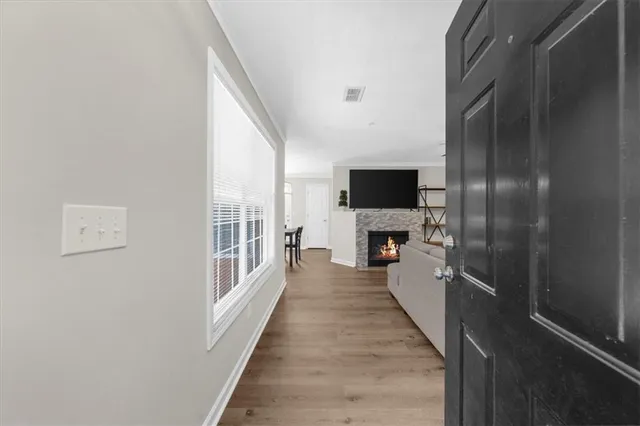 a view of a living room with a flat screen tv