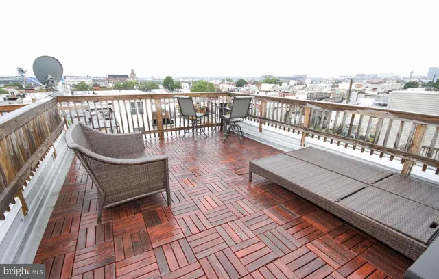 a view of a terrace with outdoor seating
