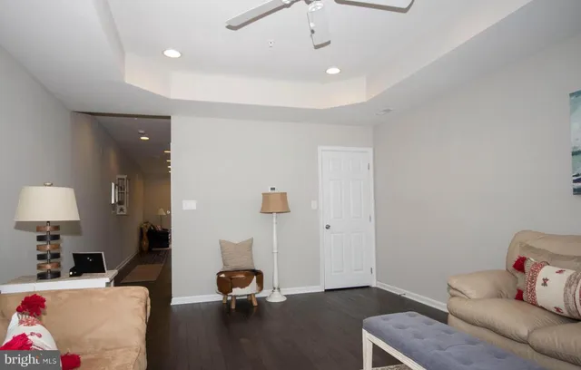 a view of a livingroom with furniture and a couch