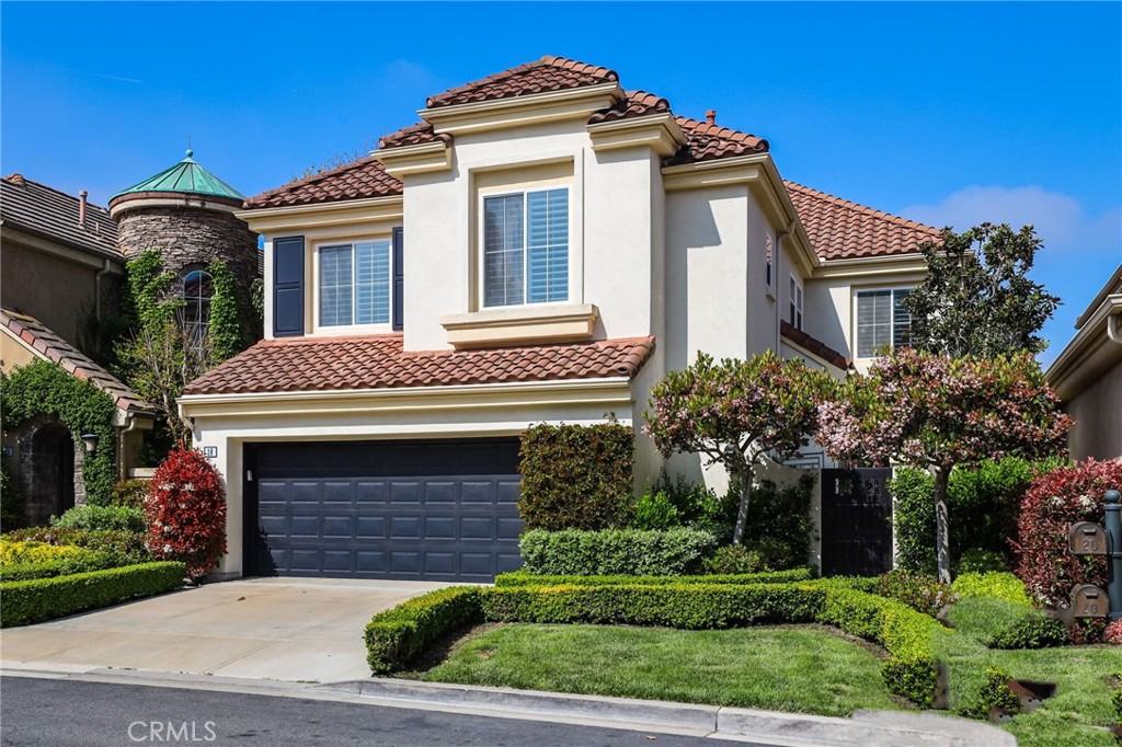 a front view of a house with a garage