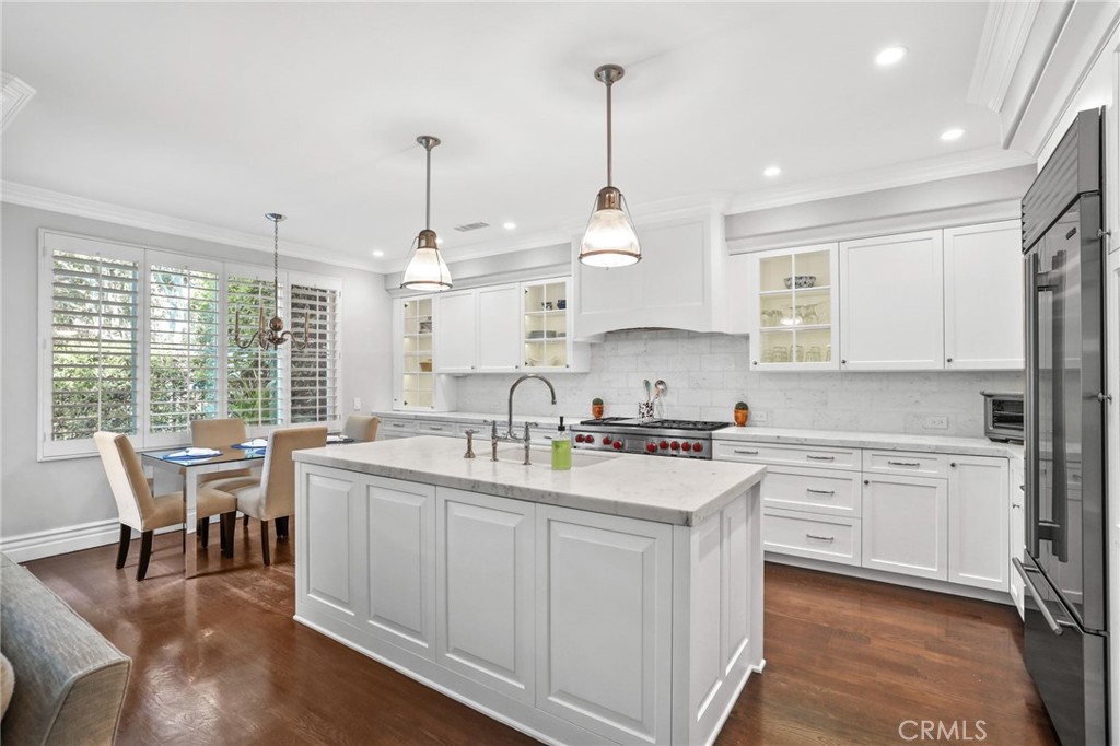 18 Lyon Newport Coast, CA 92657 - Photo 13 of 45 a kitchen with a sink stove and cabinets