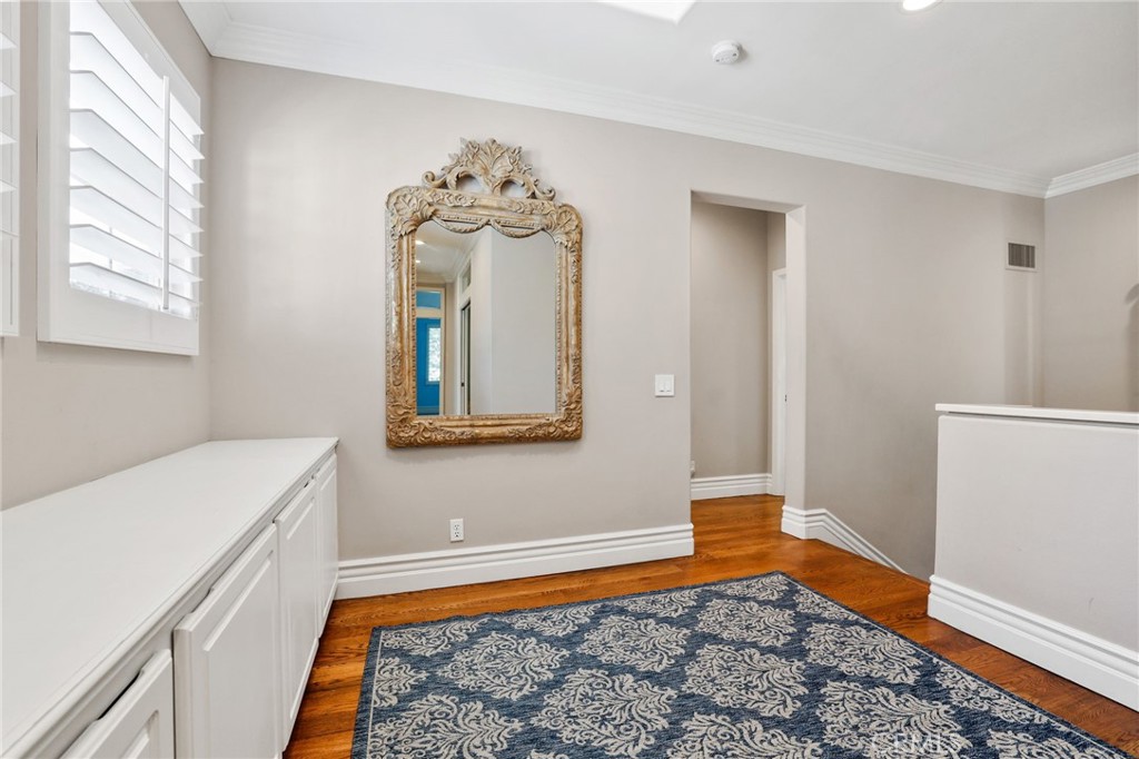 18 Lyon Newport Coast, CA 92657 - Photo 20 of 45 a bedroom with a bed and a window