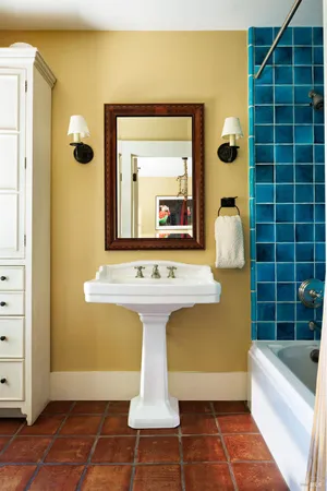 a view of a garden with plants and large trees