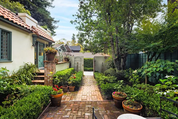 a backyard of a house with lots of green space
