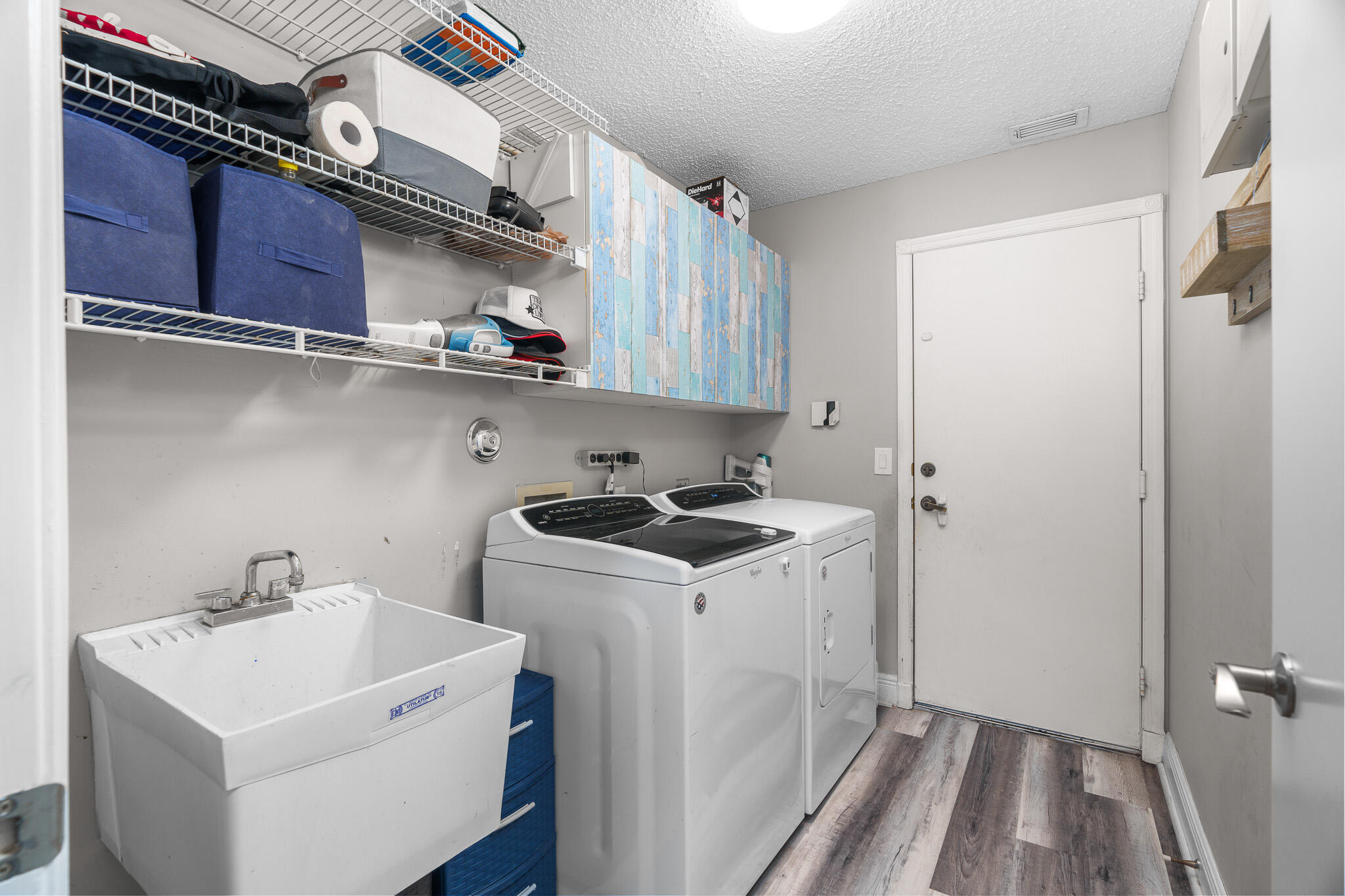 19916 Dinner Key Drive Boca Raton, FL 33498 - Photo 42 of 73 a view of storage and utility room with washer and dryer