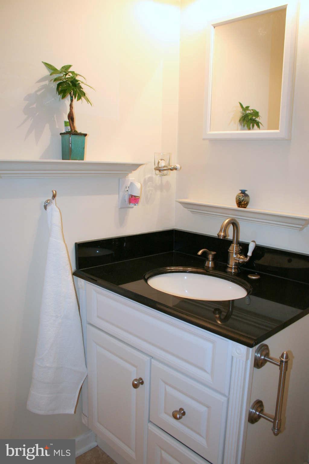 6905 Yale Road Baltimore, MD 21220 - Photo 17 of 27 Hall Bath Shower/Tub Combo and Updated Vanity