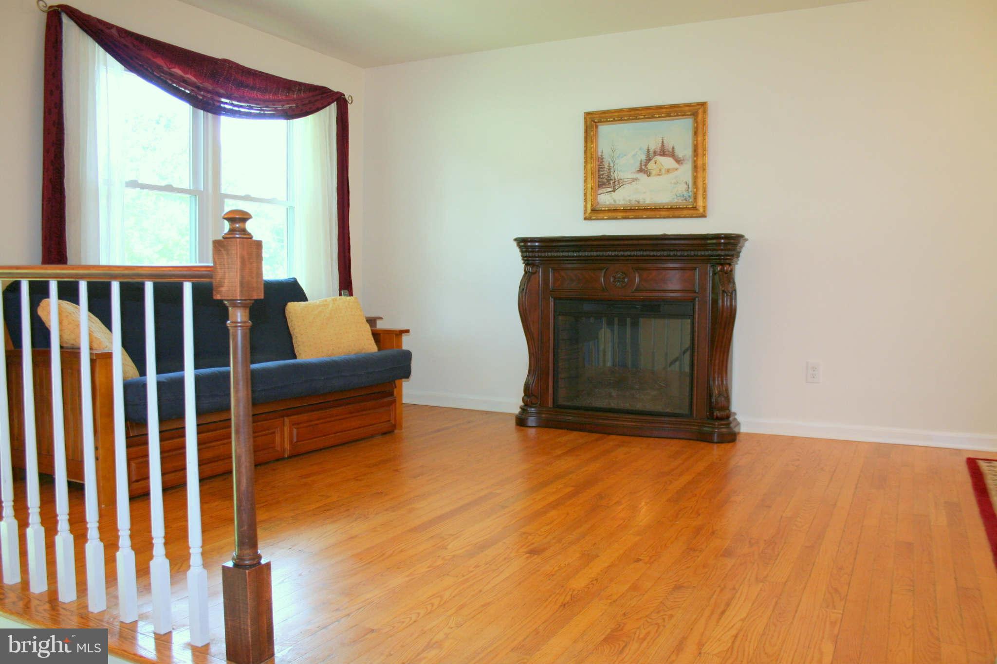 Living Room w/Hardwood Floors
