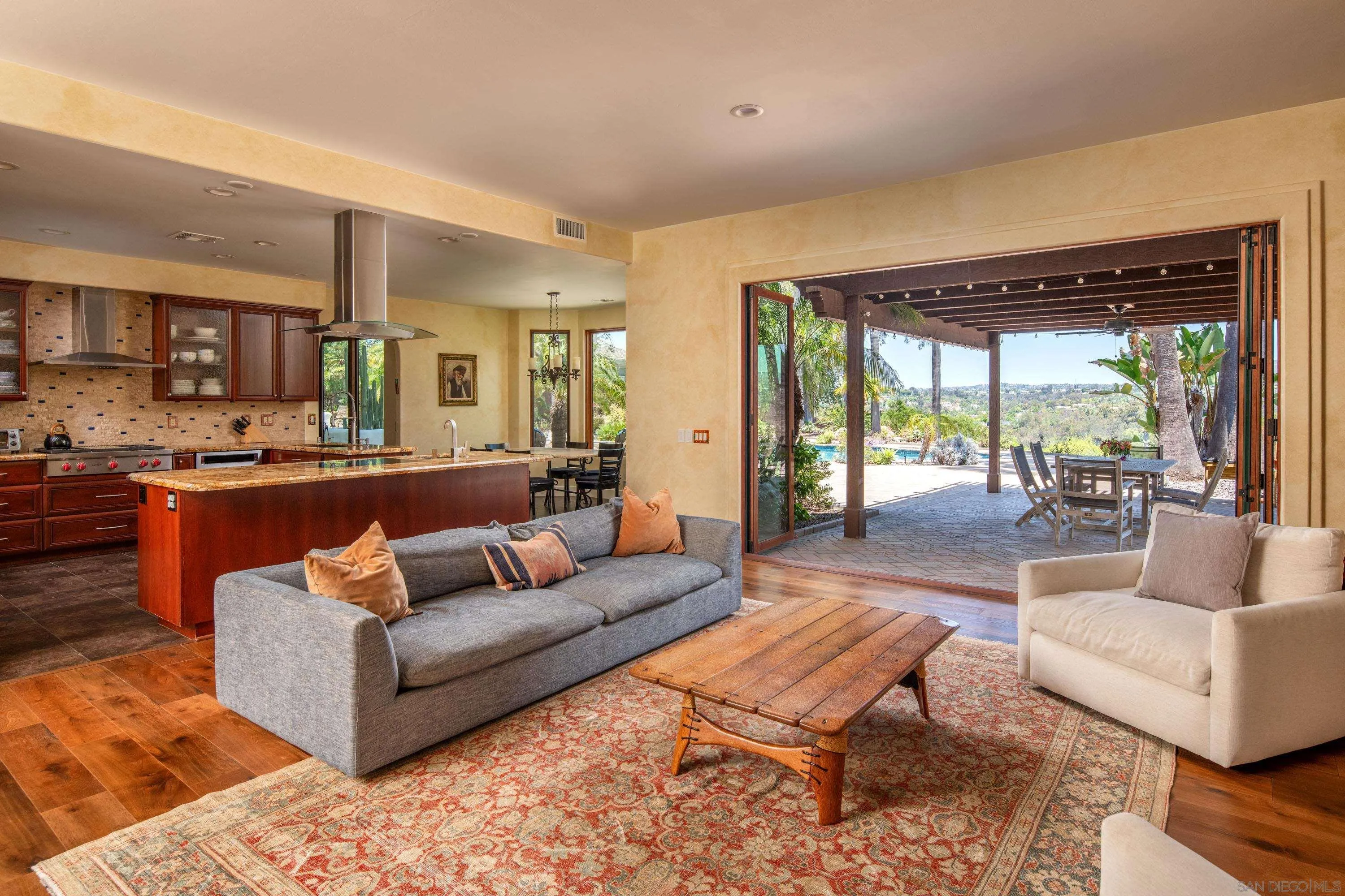 3028 Paseo Cielo Rancho Santa Fe, CA 92024 - Photo 10 of 50 a living room with furniture and a large window