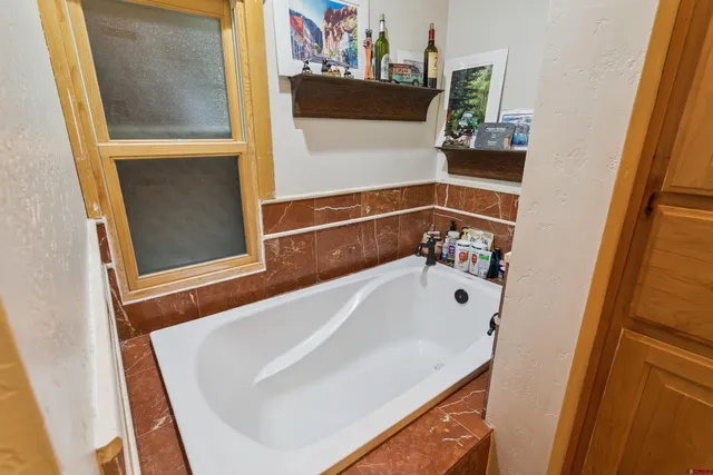 a bathroom with a tub