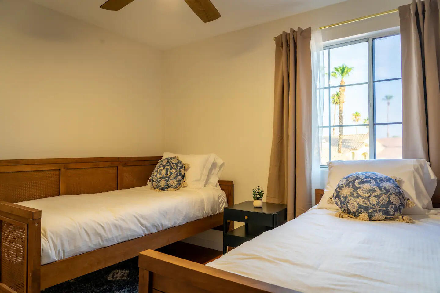 81032 Red Bluff Road Indio, CA 92201 - Photo 24 of 33 a bedroom with a bed and wooden floor