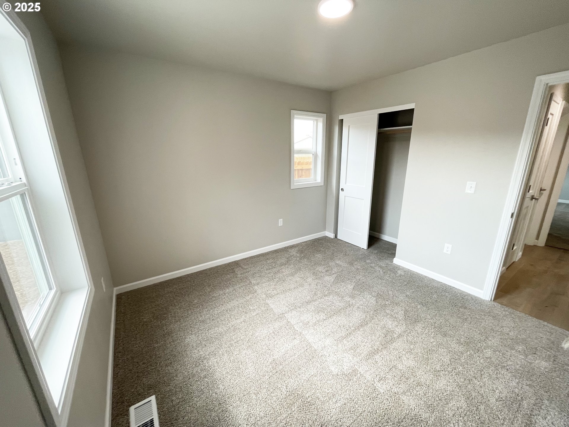 310 North Chase Street Heppner, OR 97836 - Photo 11 of 14 an empty room with windows