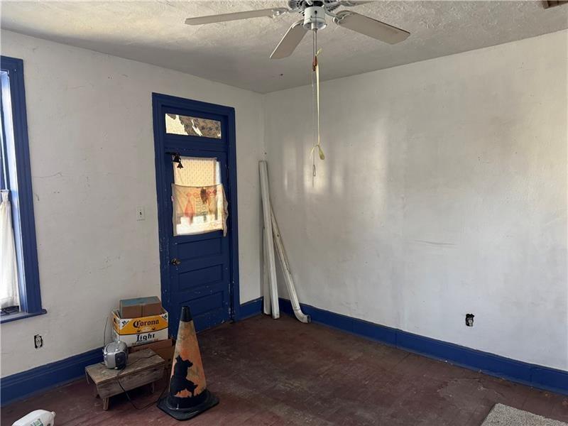 2822 Main Street Beallsville, PA 15313 - Photo 8 of 11 a room with stairs and furniture