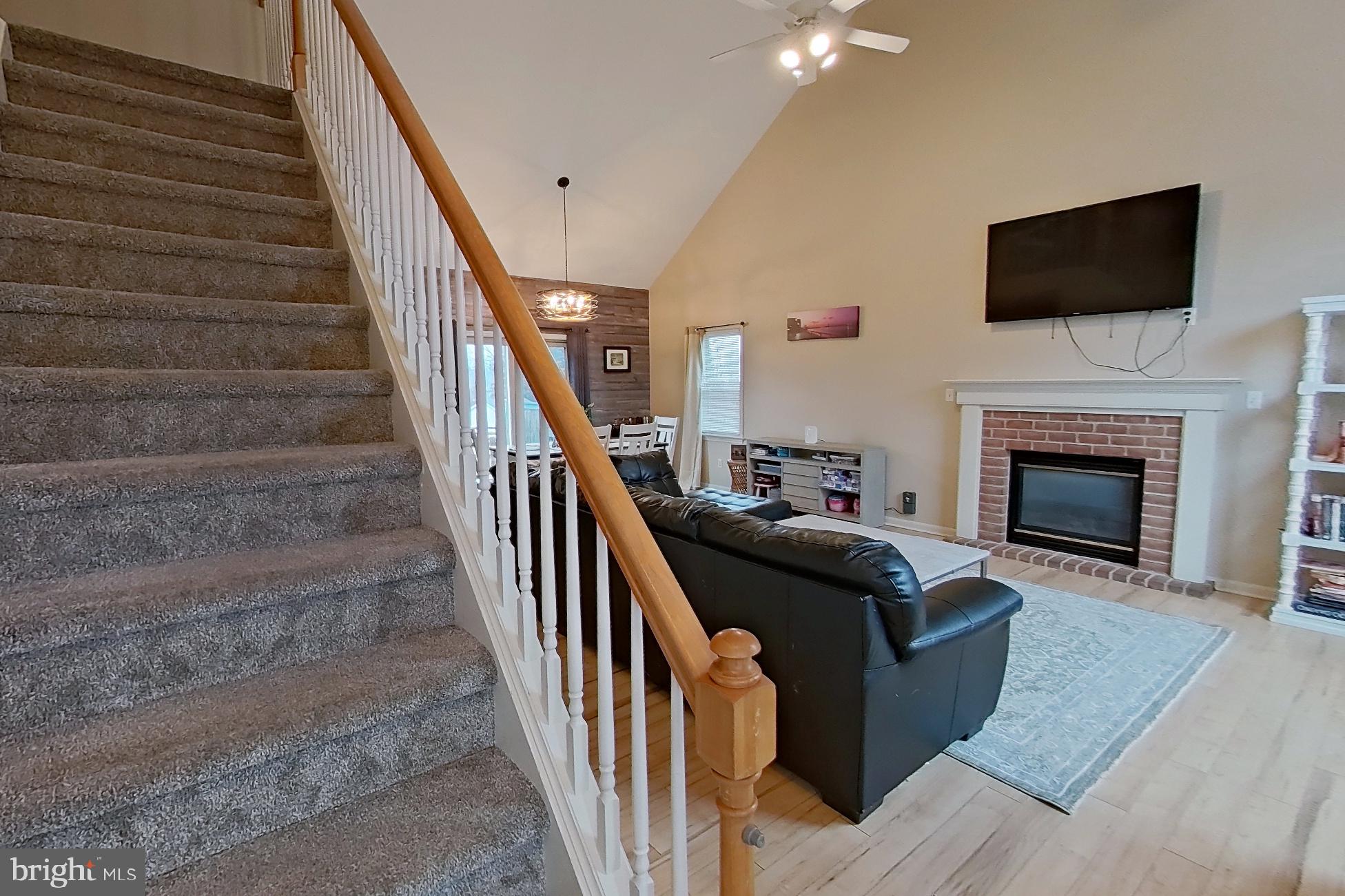44 Duffield Drive Lititz, PA 17543 - Photo 2 of 10 a living room with furniture and a fireplace