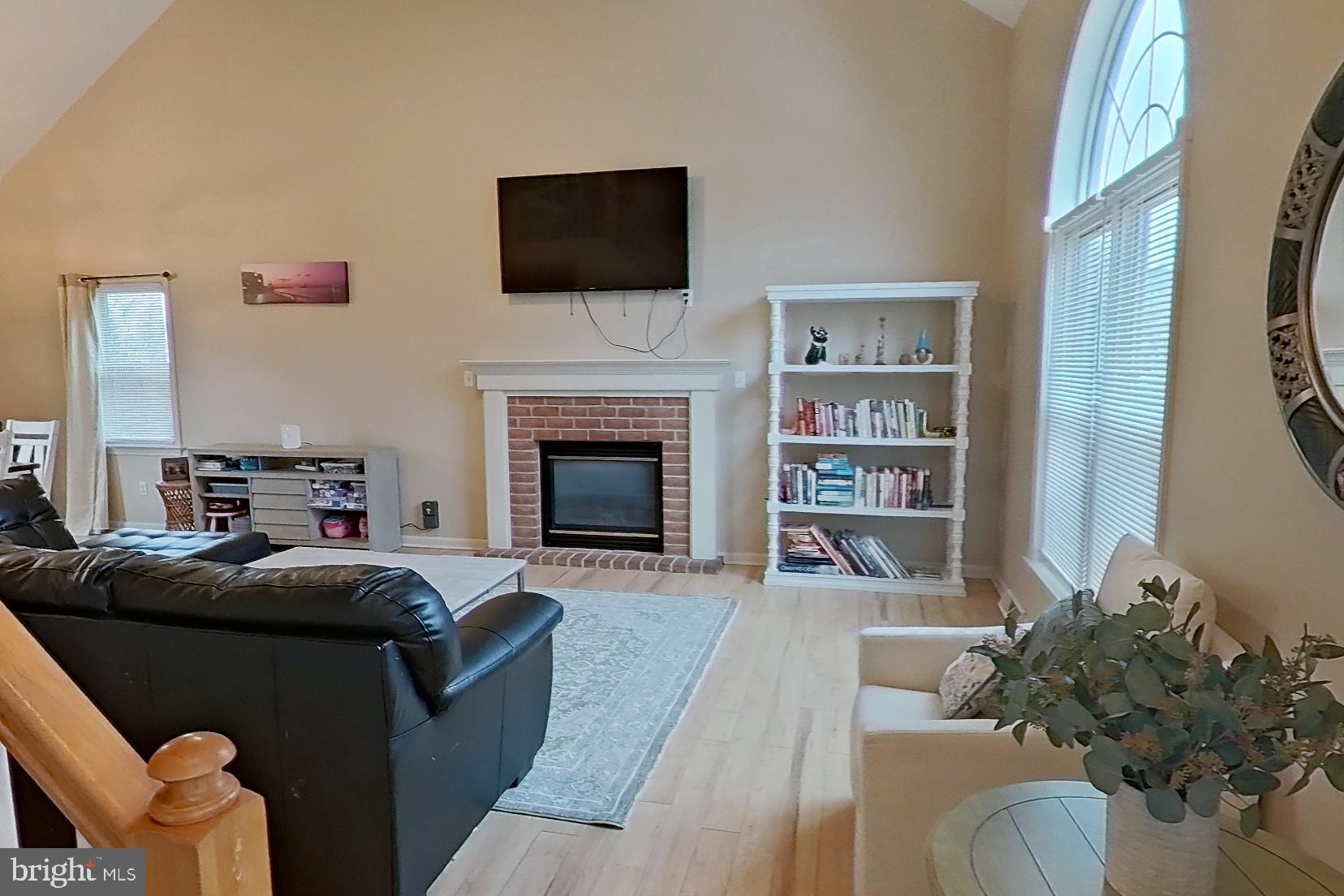 44 Duffield Drive Lititz, PA 17543 - Photo 3 of 10 a living room with furniture a flat screen tv and a fireplace