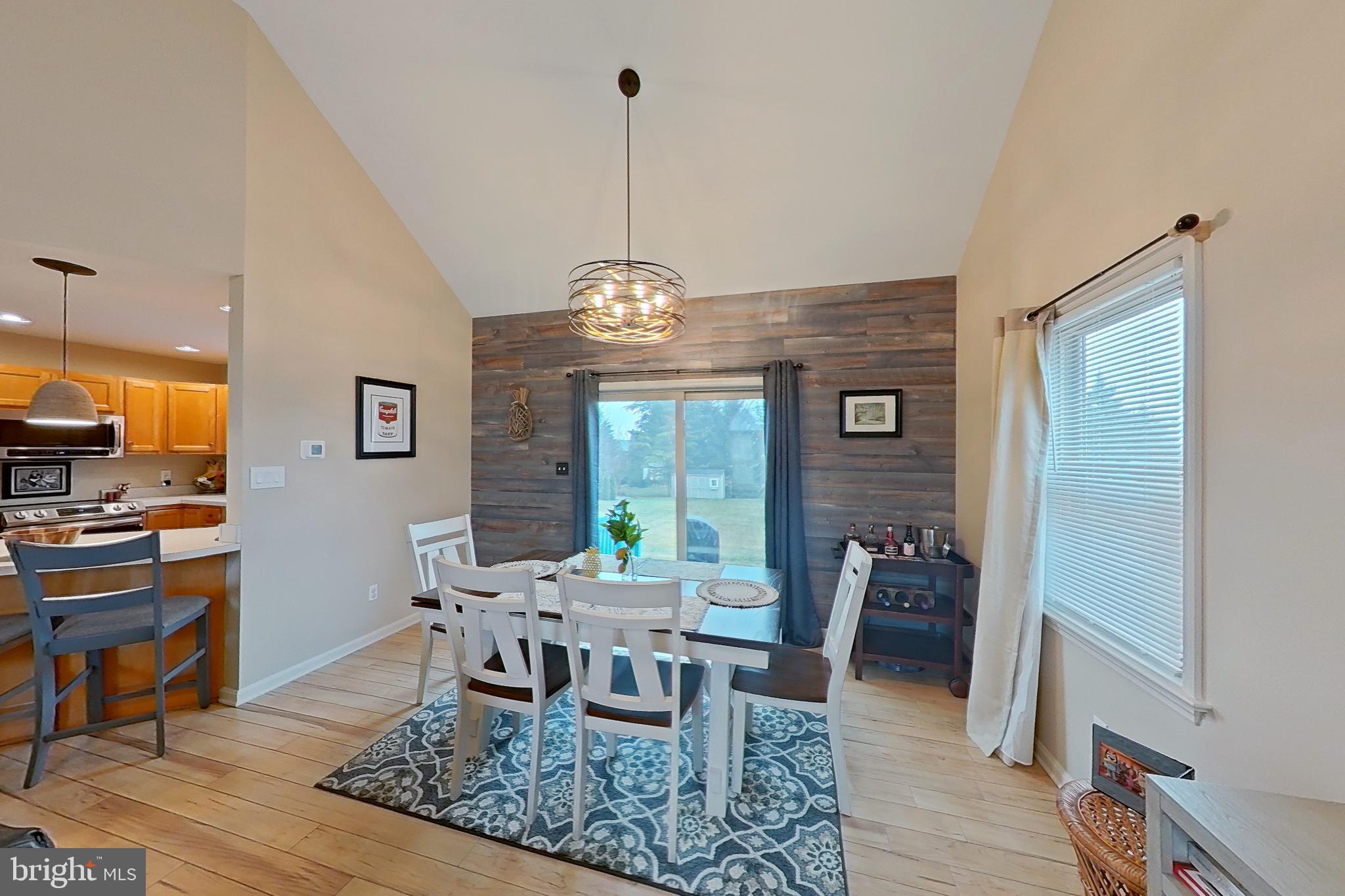 44 Duffield Drive Lititz, PA 17543 - Photo 4 of 10 a view of a dining room with furniture window and wooden floor