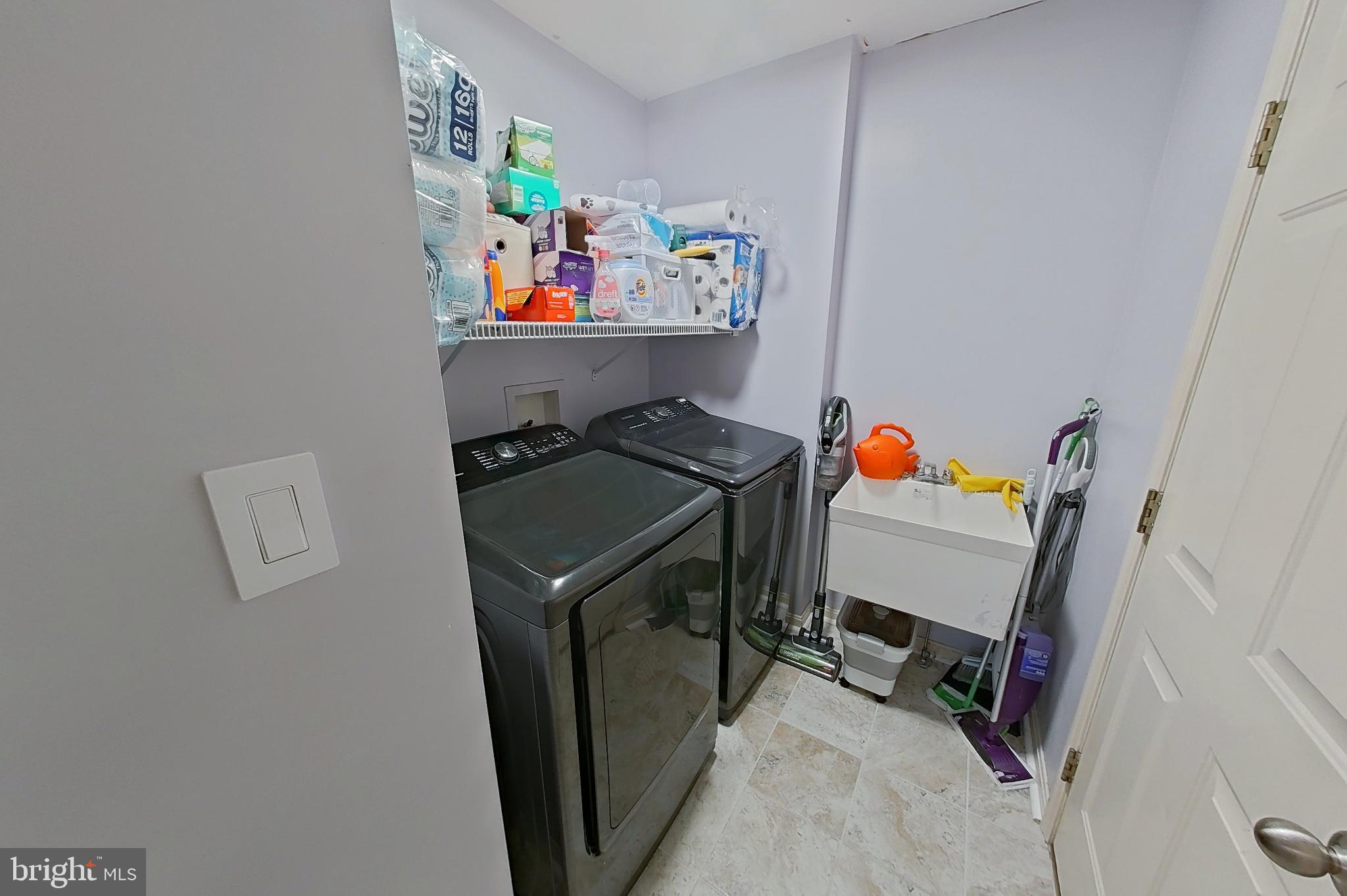 44 Duffield Drive Lititz, PA 17543 - Photo 6 of 10 a utility room with dryer and washer