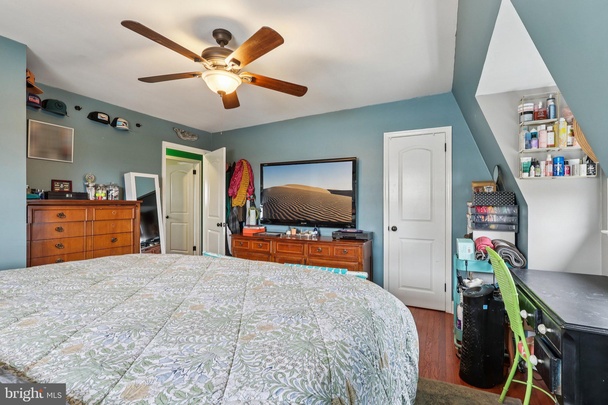 3442 Holyoke Road Philadelphia, PA 19114 - Photo 20 of 35 a bedroom with a bed and a flat screen tv