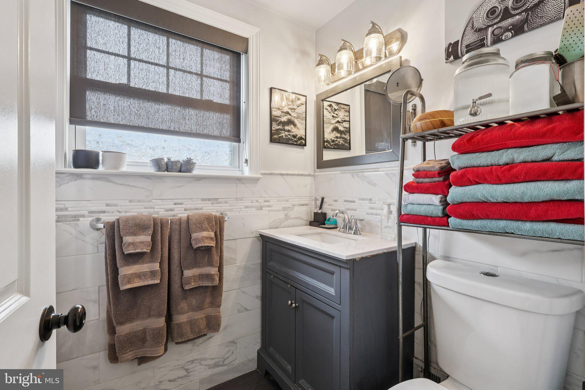 3442 Holyoke Road Philadelphia, PA 19114 - Photo 27 of 35 a bathroom with a sink toilet vanity and window