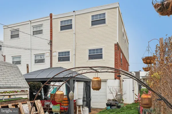 a view of a house with wooden deck