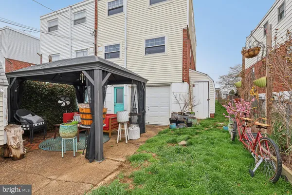 a outdoor seating area with furniture