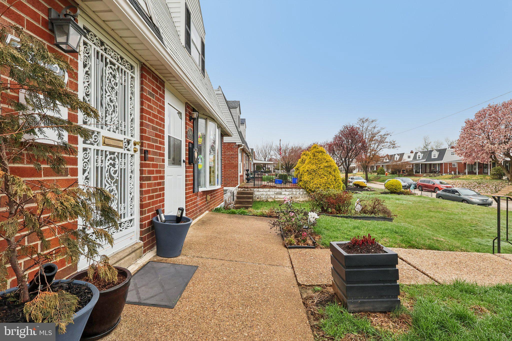3442 Holyoke Road Philadelphia, PA 19114 - Photo 5 of 35 a front view of a house with garden and porch