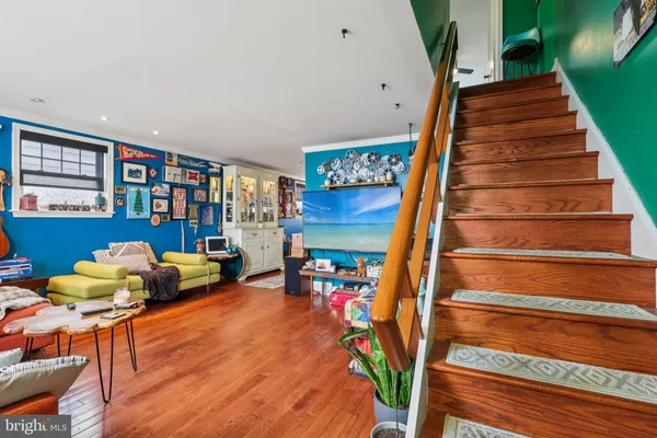 a bed room with furniture and stairs