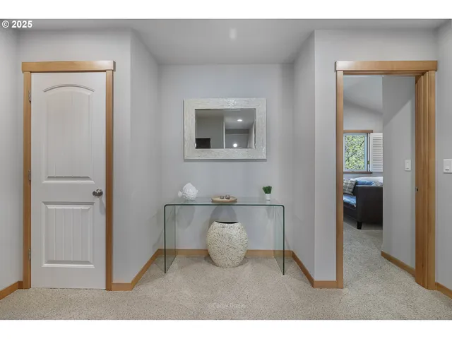 a view of bathroom with a sink and a mirror