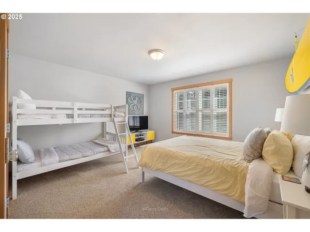 a bathroom with a sink vanity granite and a mirror