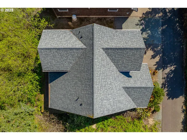 an aerial view of a house having yard