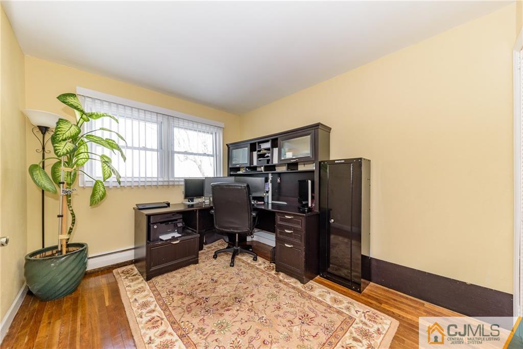 7 Exeter Road Fords, NJ 08863 - Photo 11 of 25 a view of workspace with wooden floor windows