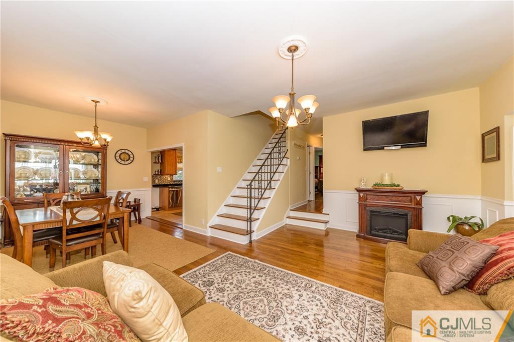 7 Exeter Road Fords, NJ 08863 - Photo 3 of 25 a living room with furniture and a flat screen tv