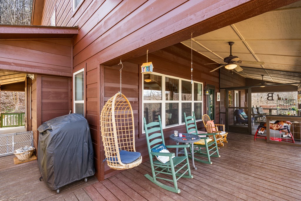 961 South Brooks Cove Road Hayesville, NC 28904 - Photo 38 of 55 a front view of a house with outdoor seating