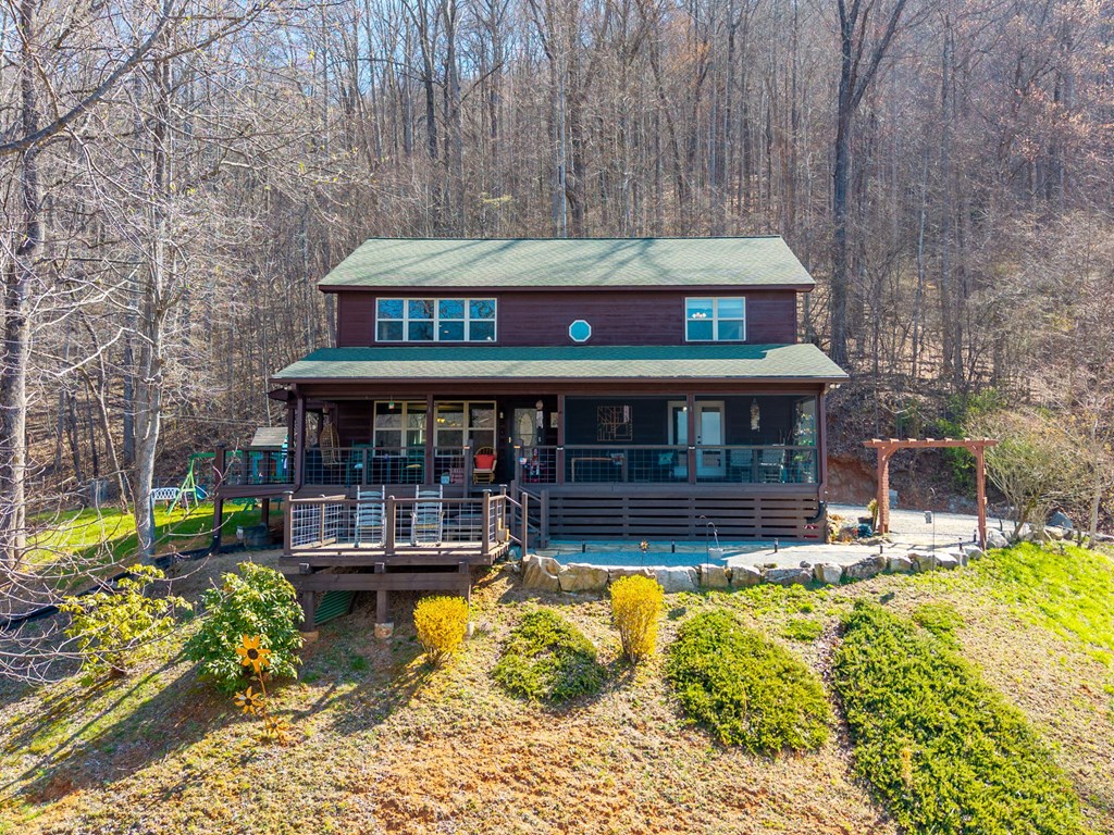 961 South Brooks Cove Road Hayesville, NC 28904 - Photo 39 of 55 a view of a swimming pool with a patio